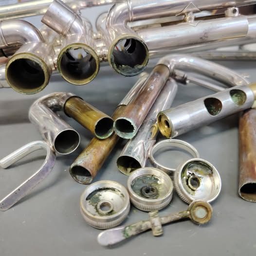 Trumpet valve casings and slides with heavy build-up